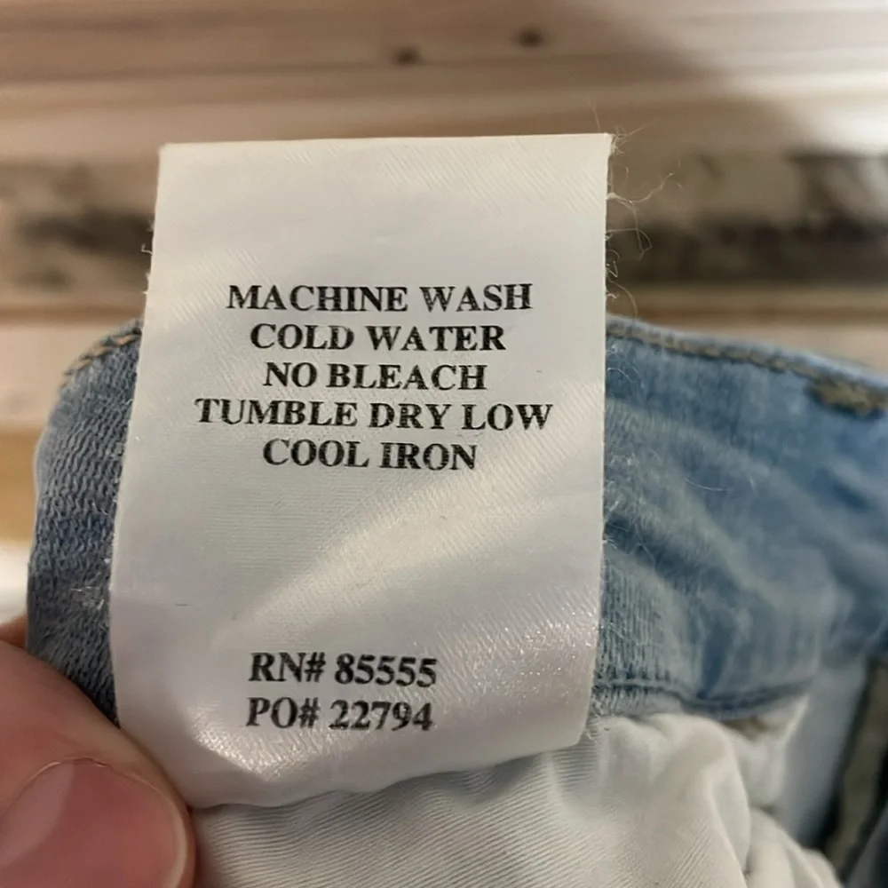 Studio Blue size 32 light wash super stretchy distressed straight leg jeans